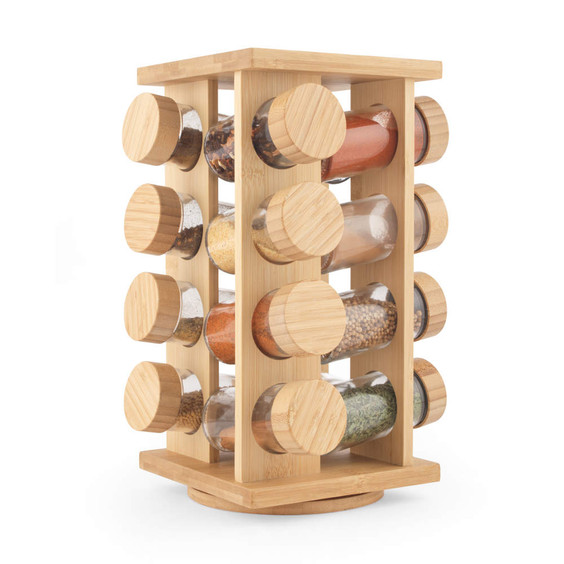 Rotating bamboo spice rack with glass jars filled with assorted spices