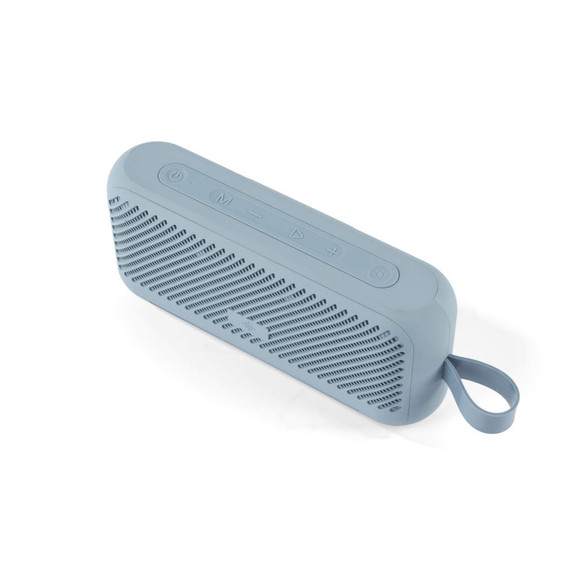 Light blue portable Bluetooth speaker with loop strap, angled view