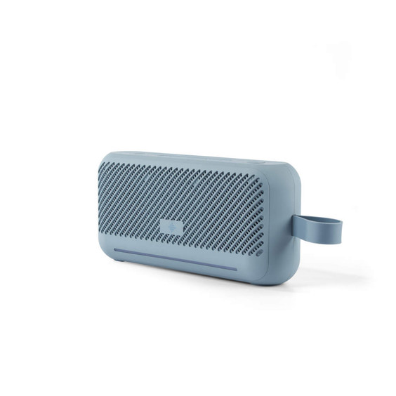 Blue portable speaker with rounded edges and a loop, shown angled on a white background
