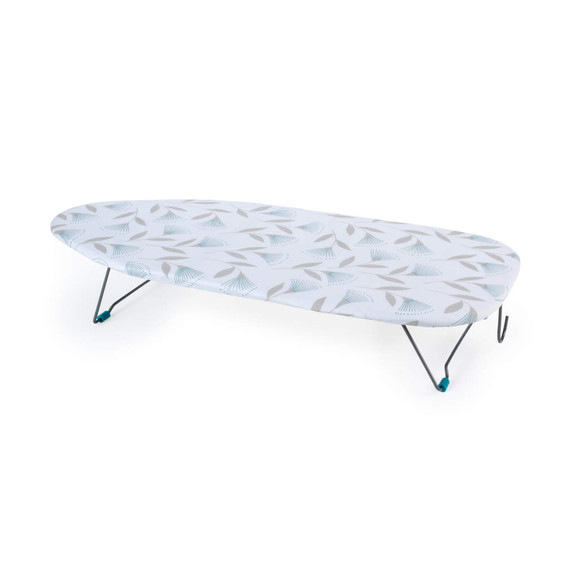 Foldable tabletop ironing board with white and grey leaf pattern cover