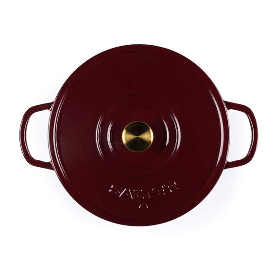 Red cast iron casserole dish with lid, top view, gold knob on handle