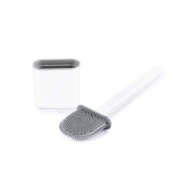 Grey silicone toilet brush with matching holder, angled cleaning head.