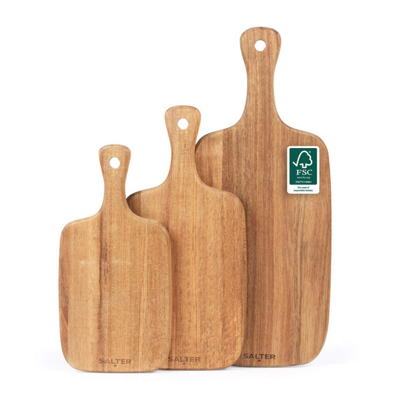 Set of three wooden chopping boards with handles, natural finish, displayed upright