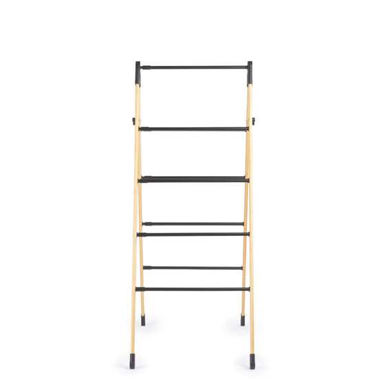 Foldable bamboo and black metal clothes airer with five rails, shown front view.