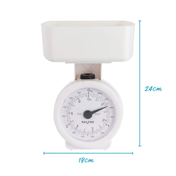 White mechanical kitchen scale with bowl, shown front view. 2kg max. Dimensions: 24cm high, 18cm wide.