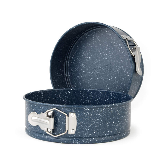 Blue speckled springform cake tin with open latch, shown at slight angle