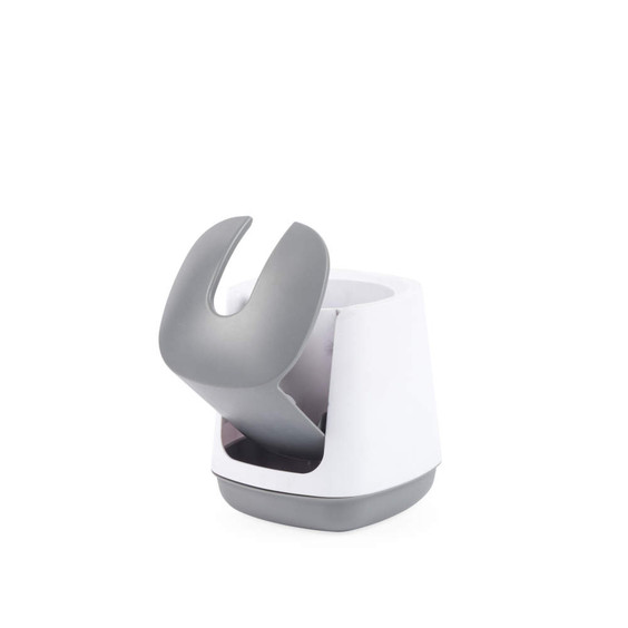 Grey and white toothbrush holder with brush rest, shown at an angle