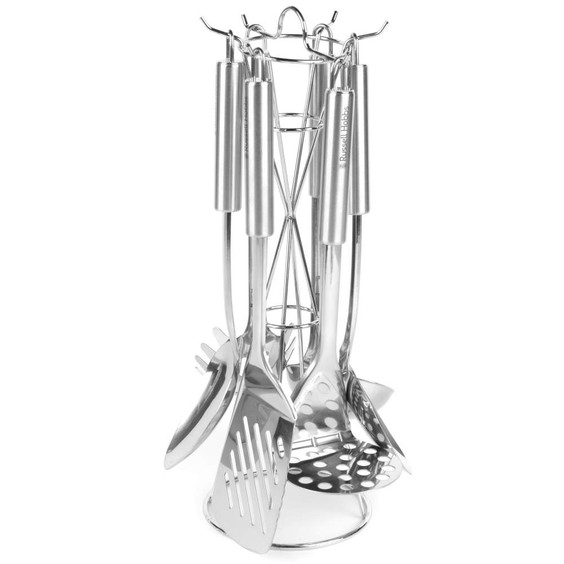 Set of stainless steel kitchen utensils on a stand