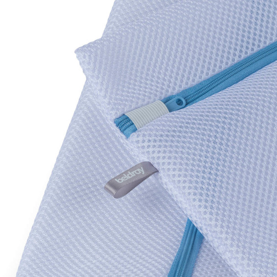 White mesh laundry bag with blue zip and Beldray label, shown close up.