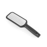 Black handled flat cheese grater with stainless steel blade, angled on white background