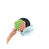 Blue electric bubble waffle maker with cooked bubble waffle inside, lid open