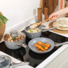 Salter Marble 4 piece non-stick grey pan set packaging with pans shown