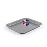 Grey non-stick rectangular roasting tray, angled view, with Made in the UK badge.