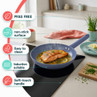 Blue non-stick frying pan cooking salmon, with PFAS-free and induction-suitable features