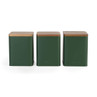 Set of three green metal storage canisters with wooden lids, frontal view