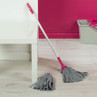 Grey microfibre mop with pink handle and spare head, shown with cleaning bucket