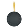 Non-stick frying pan with gold handle, shown from above.