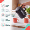 Black cordless kettle pouring water, with 3000W power and 1.7L capacity features shown