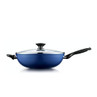 Blue non-stick frying pan with glass lid, side and long handle, shown on white background