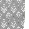 Grey and white ikat pattern fabric close-up