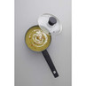 Grey non-stick saucepan with glass lid, shown filled with vegetable soup.