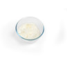 Glass bowl of plain white cream cheese from above
