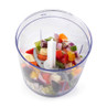 Food chopper bowl with mixed chopped vegetables inside, shown from above.