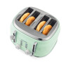 Green four-slice toaster with sesame seed bagels in each slot, angled view