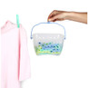 Plastic basket with blue handle, filled with assorted green and blue clothes pegs.