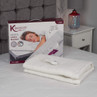 King size heated under blanket with controller, displayed on a bed with retail box.