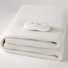 White electric blanket folded with attached control unit