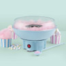 Blue candy floss maker with pink sugar being poured in, shown on a kitchen counter.