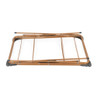 Folded metal frame in copper finish for guest bed, shown from above