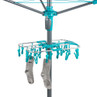 Rotary airer with blue pegs and two grey socks hanging, shown for drying laundry.