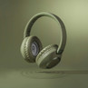 Green over-ear wireless headphones with padded earcups, shown on plain background