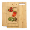 Set of three bamboo chopping boards, small board shown with strawberries and kiwi slices.