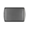 Grey non-stick baking tray with raised edges, viewed from above.