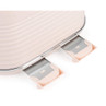 Close-up of pink toaster with two removable crumb trays extended