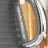 Close-up of grey electric kettle handle and water level indicator