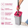 Compact grey mop bucket with pink wringer, foot pedal and dual water compartments