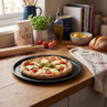 Fresh homemade Margherita pizza with tomatoes and basil on baking tray in kitchen setting