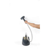 Grey garment steamer with flexible hose, shown in use against white background