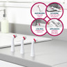 Set of three white replacement cleaning brush heads with red accents on kitchen counter