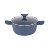 Blue non-stick casserole pot with glass lid, viewed from above