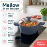 Blue 24cm stockpot with glass lid on hob