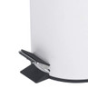 White pedal bin close-up showing foot pedal and base