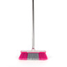 Pink and grey soft-bristle broom with metal handle, shown upright on white background