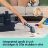 Carpet cleaner lifting stubborn dirt from cream carpet