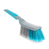 Blue and grey cleaning brush with curved handle on white background