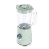 Green electric jug blender with clear plastic jug, shown at an angle